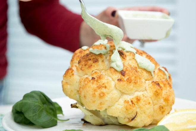 When whole roasted cauliflower meets basil-infused tahini, something magical happens! The flavors in this simple dish will wow a crowd. Get the recipe!