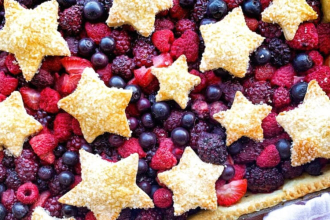 This Mixed Berry Slab Pie recipe by Michelle, blogger behind Michelle Sips & Savor, is the perfect addition to your July 4th menu! Get the recipe.