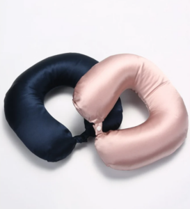 Navy blue and soft pink travel neck cushions