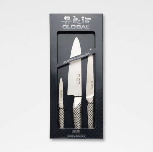 Three kitchen knives by global in different sizes.